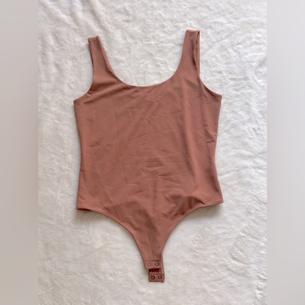 Tan bodysuit from Express size L